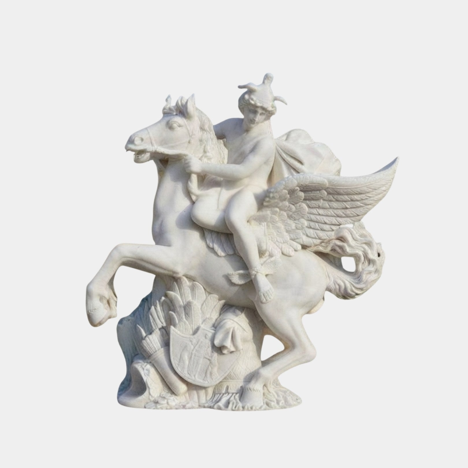 White marble rider in a winged cap seated on a winged horse with foreleg raised