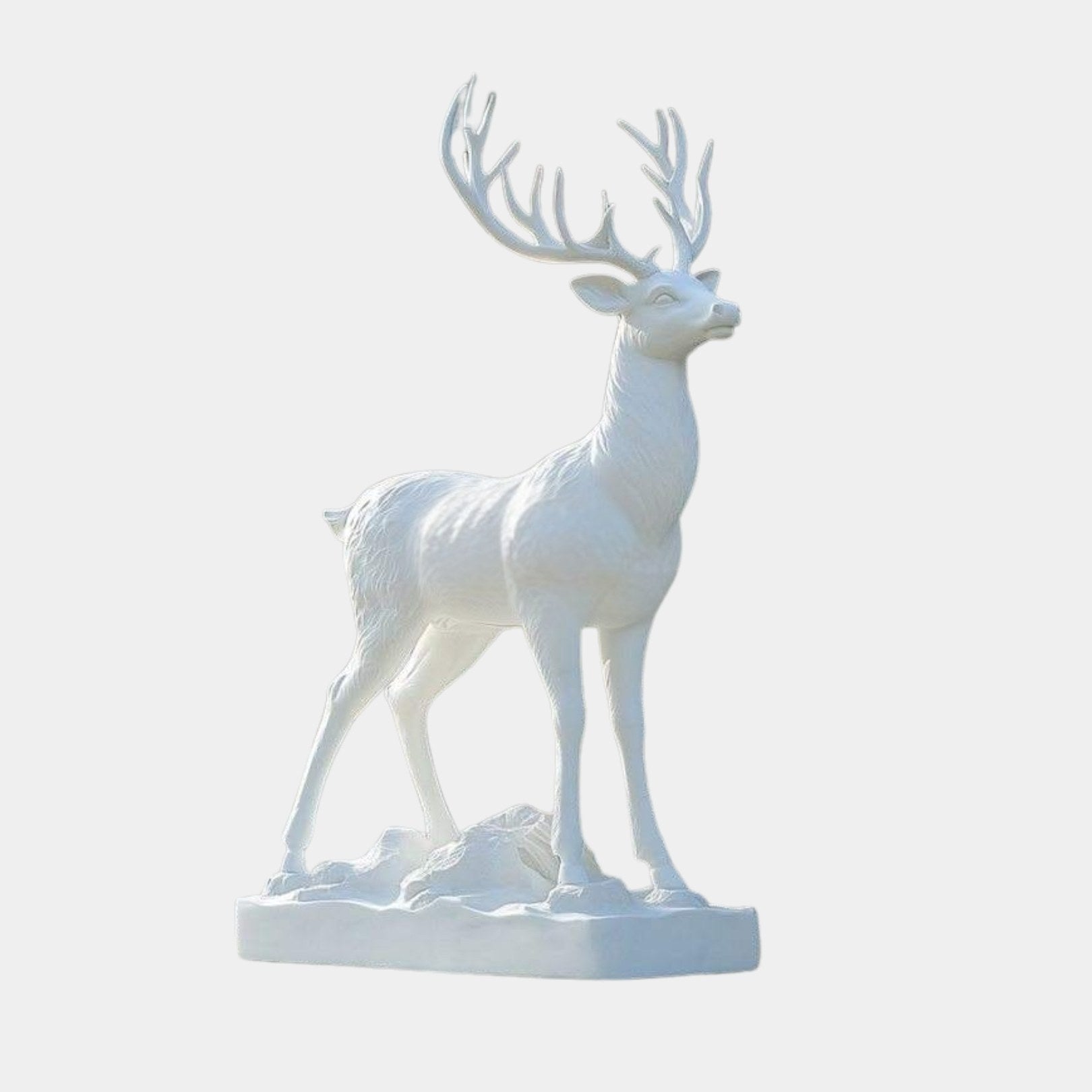 Brilliant white marble stag standing beneath a full spread of pierced antlers