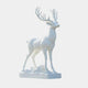 Brilliant white marble stag standing beneath a full spread of pierced antlers