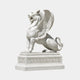 White marble winged lion seated with jaws open and both wings swept back