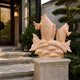 Peach marble carp group shown beside a garden gate and lantern