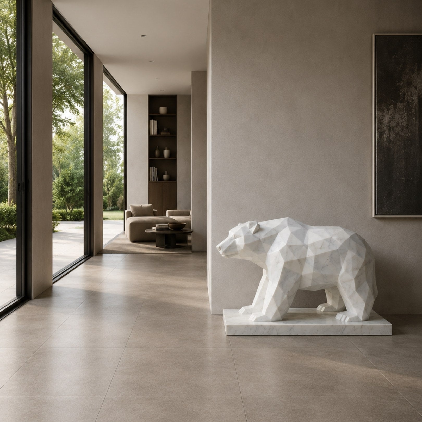 Faceted white marble bear on its slab, shown in a modern hall