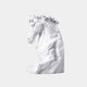 White marble horse head rising from a rough unworked block of stone