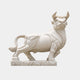 White marble bull standing with combed dewlap and up-curving horns