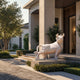 White marble bull on its slab at the steps of a modern entrance