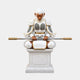 Painted and gilded marble Sun Wukong seated with his staff across his knees