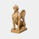 Beige marble winged sphinx couchant with a lion mask on its breast