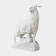 White marble sheep standing on carved rock with long ringed horns