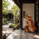 The apricot phoenix set against a pale wall on a Chinese courtyard veranda