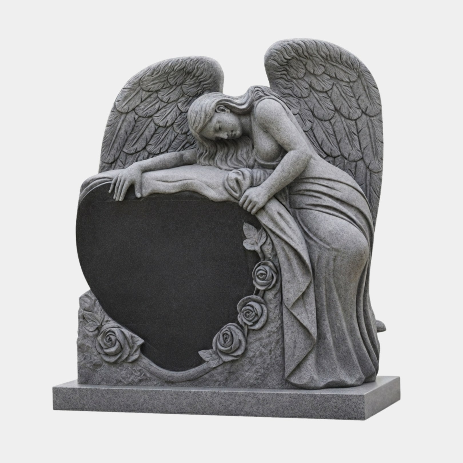 Grey granite angel leaning over a polished black heart tablet with carved roses, 140cm