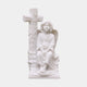 White marble child angel seated at a rustic ivy-wound cross, 120cm