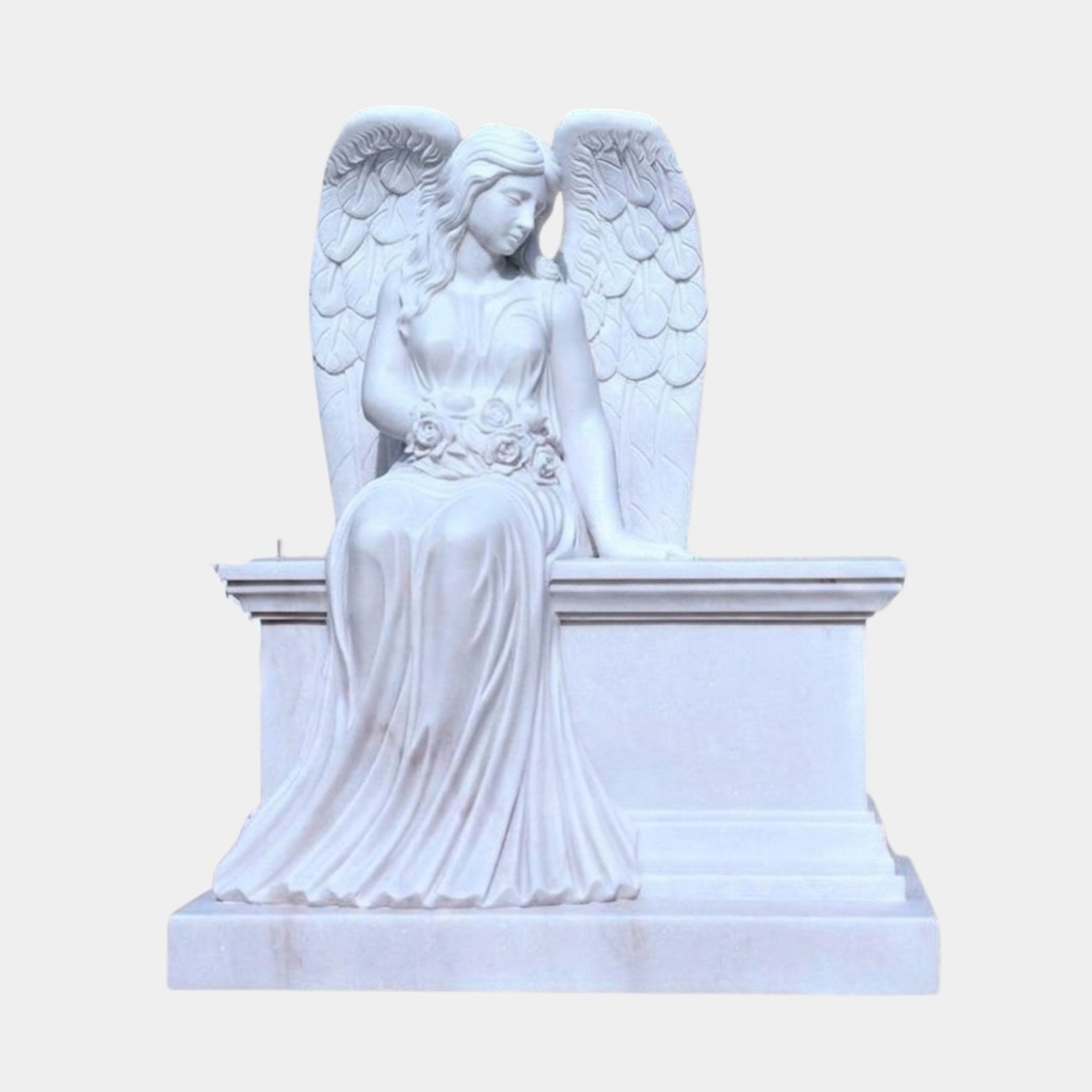 White marble angel seated on a moulded chest-form headstone with carved roses, 170cm