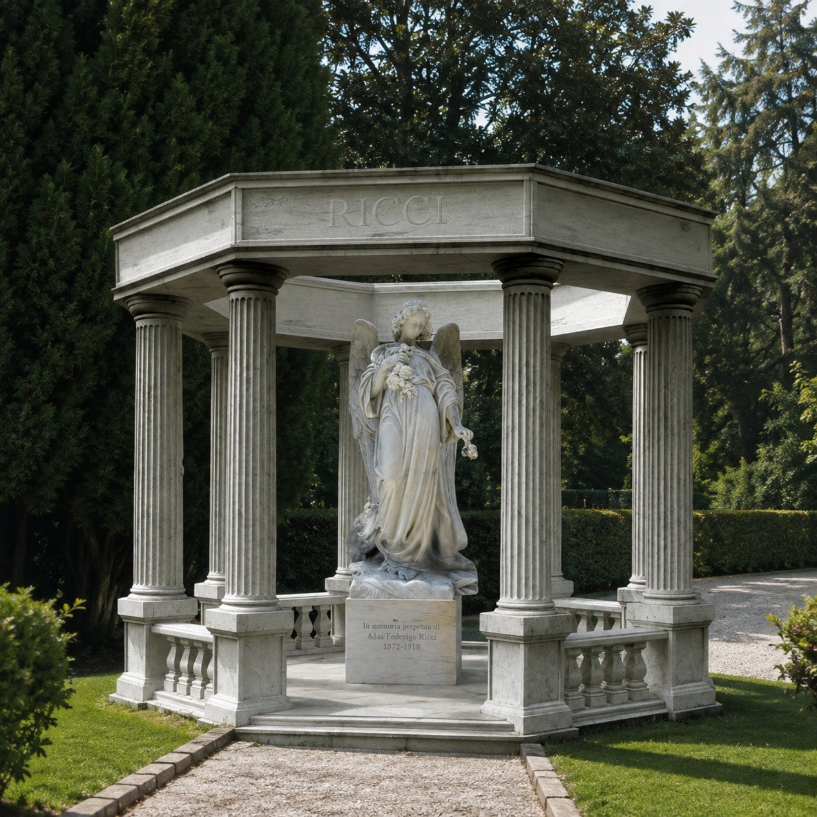 Marble mausoleum shown on a family plot with a gravel approach