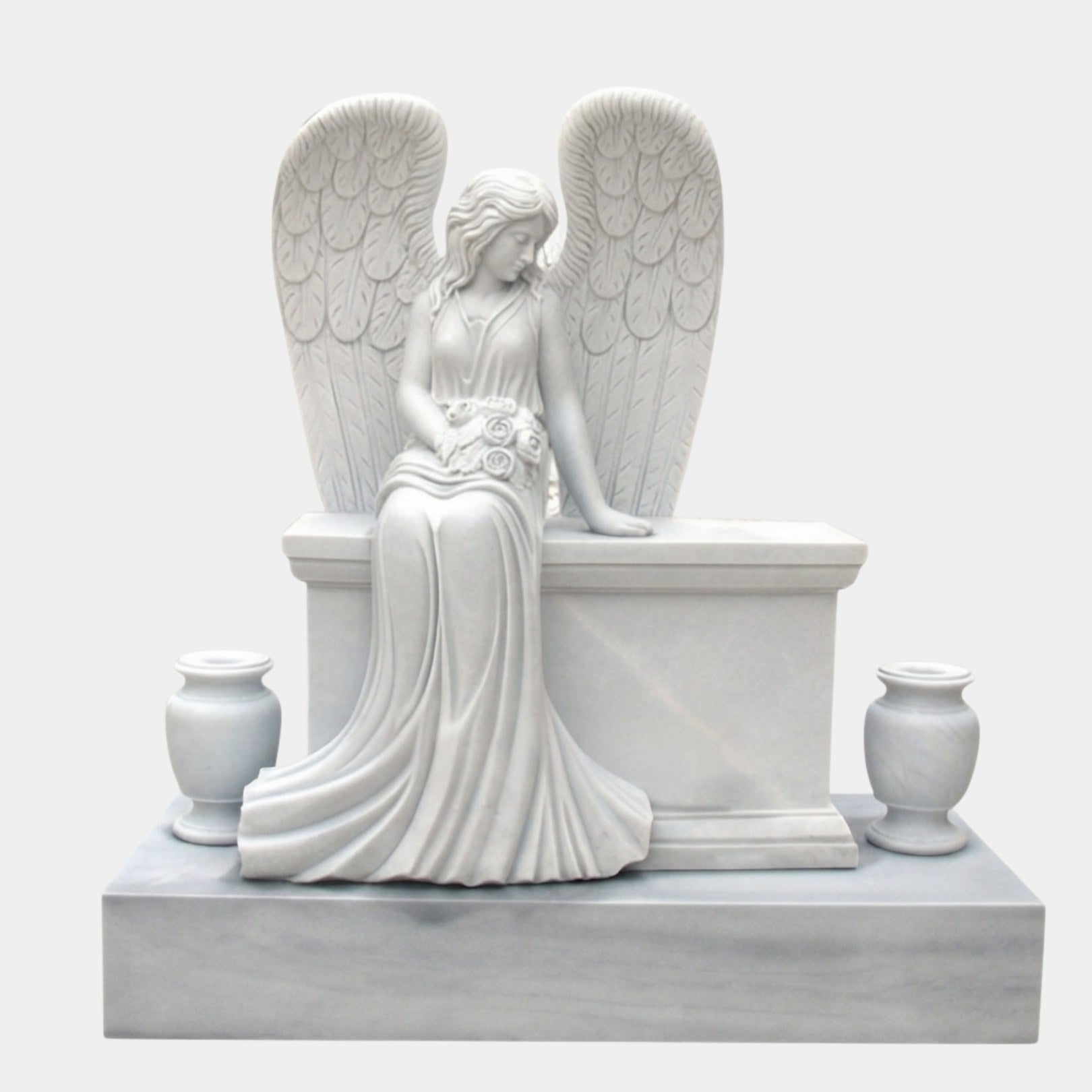White marble angel seated on a chest-form plinth with a matching urn vase each side, 150cm