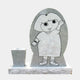 Pale grey granite headstone with a full-height engraved child figure and a flower vase, 120cm