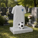 Stone football shirt child memorial shown upright on a base slab