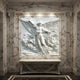 Marble angel relief wall panel shown in an interior setting