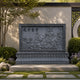Granite peony screen shown freestanding in a garden setting