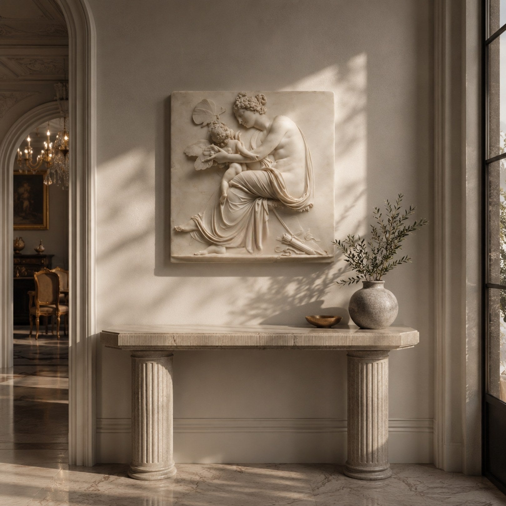 Marble woman and winged infant relief shown wall-mounted above a fluted console