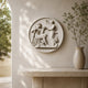 Hercules and Hebe marble roundel shown centred on a chimney breast