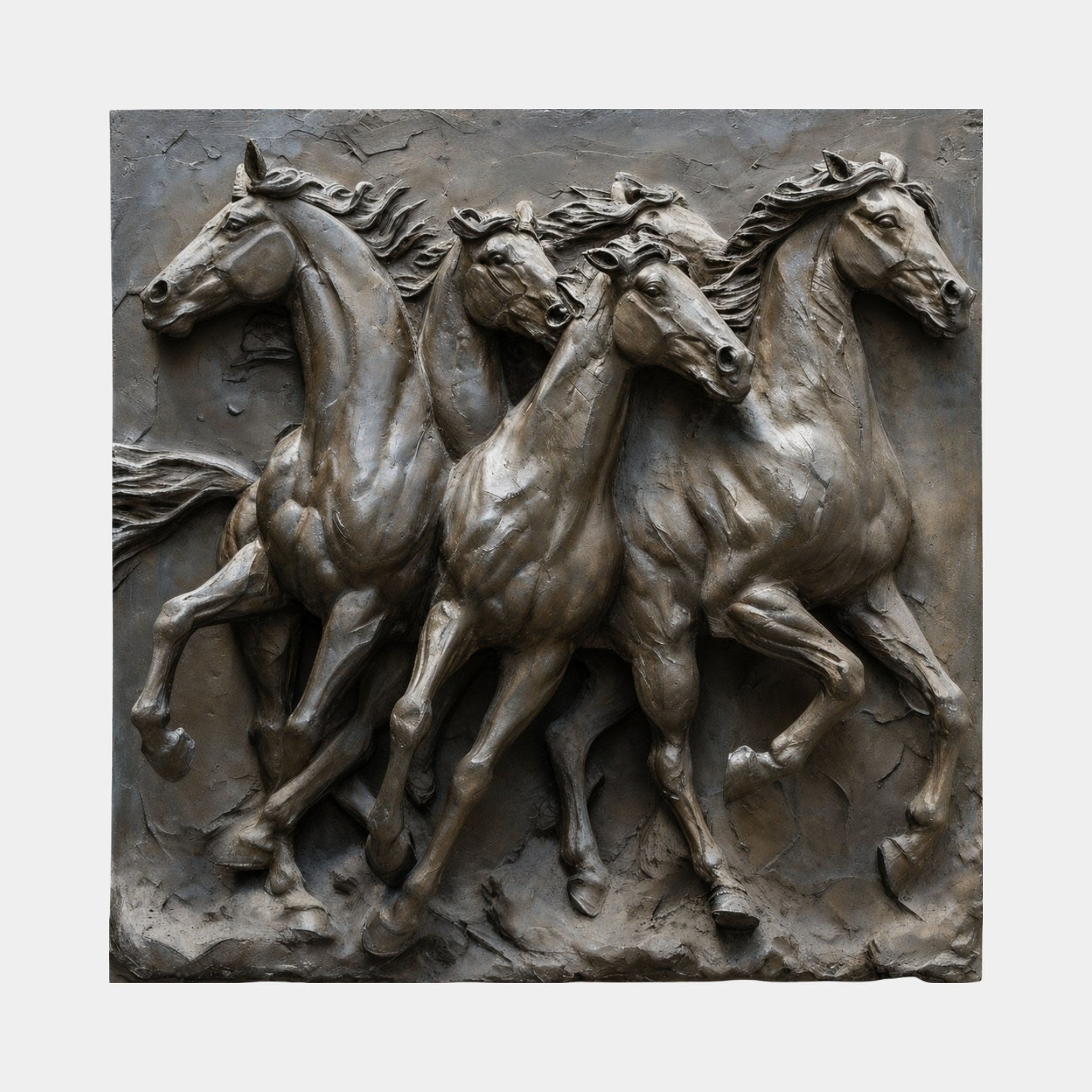 Bronze relief panel of four galloping horses with their manes flying