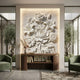 Floral bouquet marble relief panel set into an illuminated wall recess behind a walnut console
