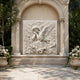 Sleeping angel marble relief slab shown low on a quiet bedroom wall