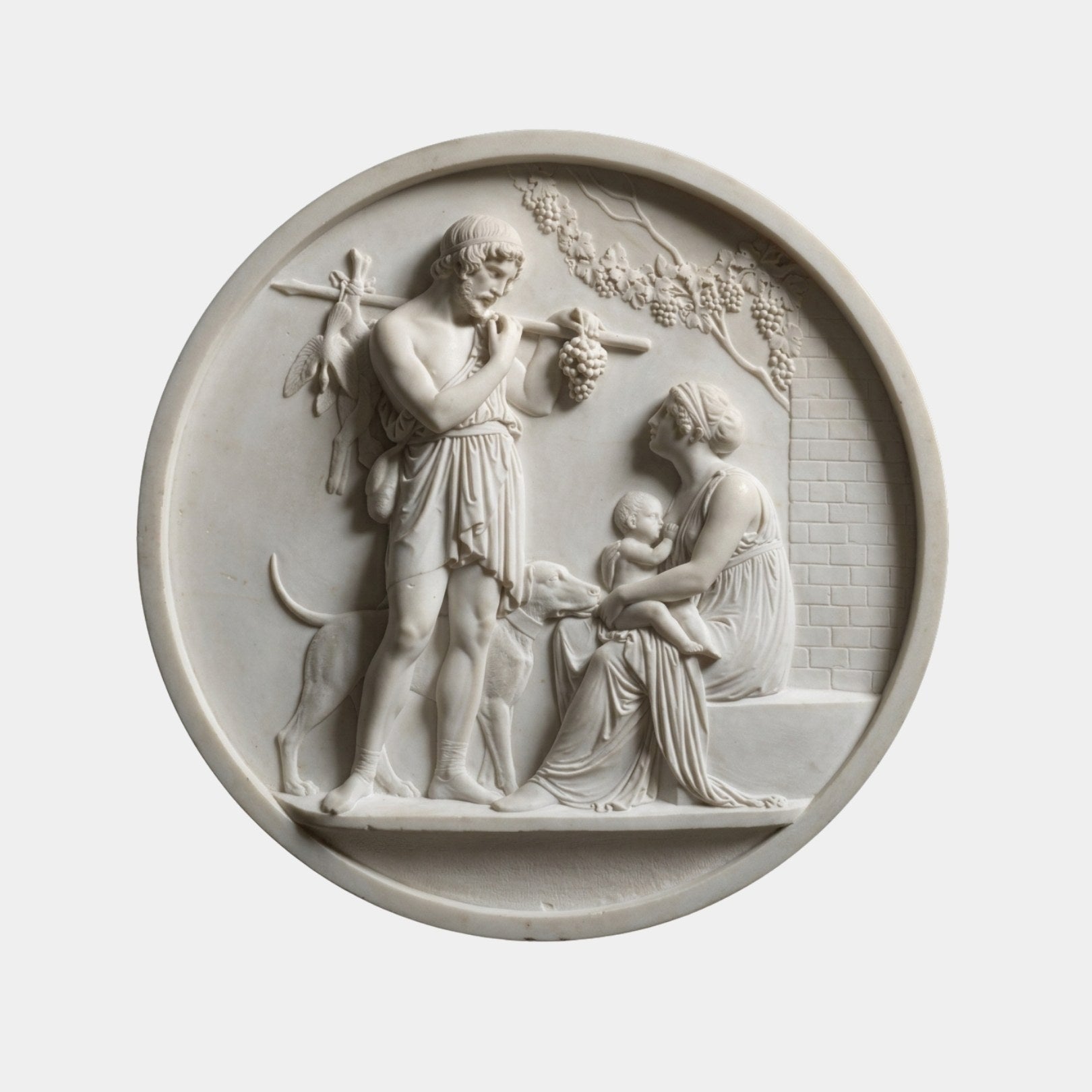 Marble roundel relief of a hunter with game and grapes beside a seated mother