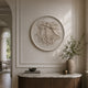 Angels and musician putti cream marble roundel shown above a music room door