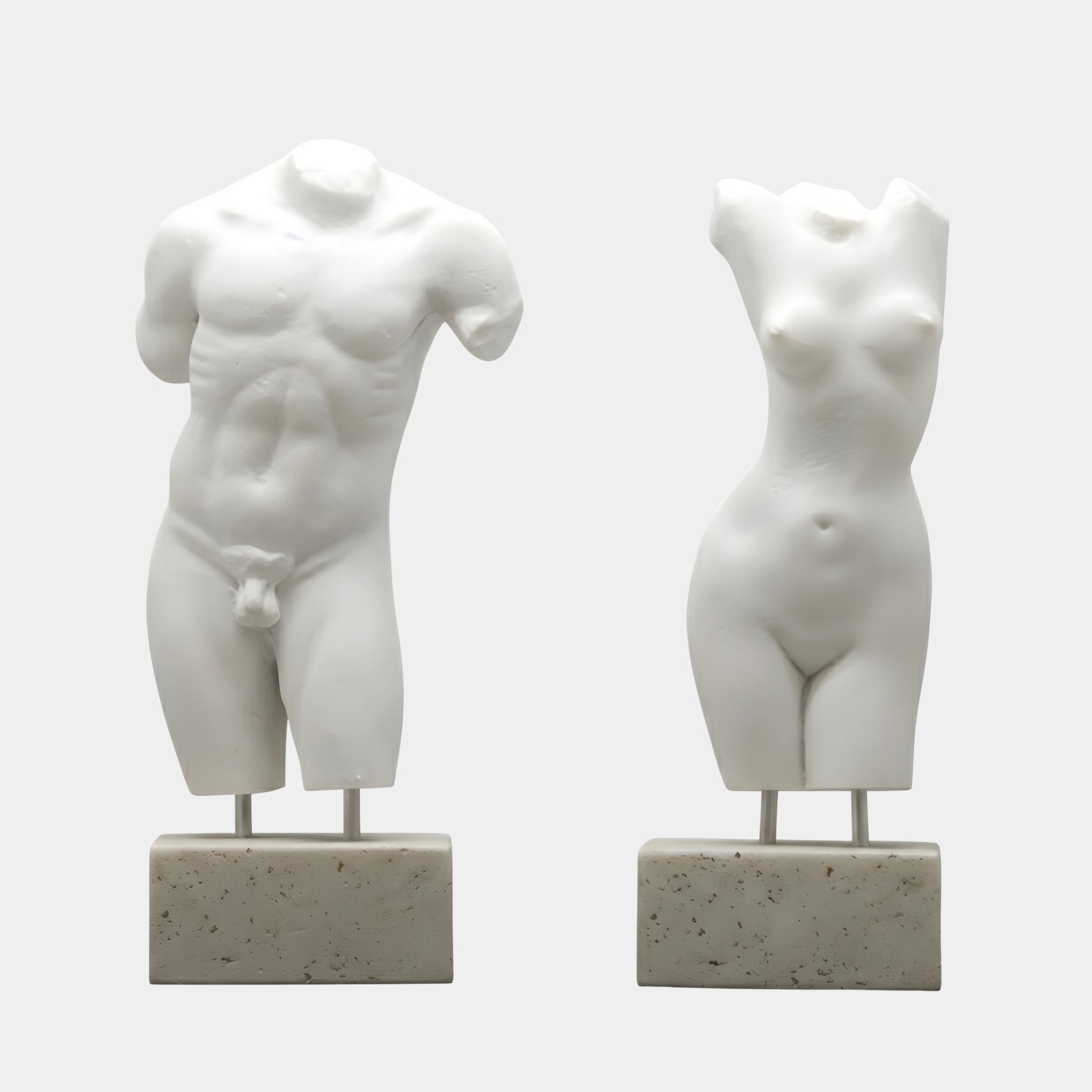 The Giant Sculptures Male & Female Marble Torso Sculpture Set - 100cm features classical headless, armless torsos on rectangular stone bases, displayed against a plain white background.