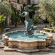 Monumental Classical Mermaid and Child Bronze Sculpture by Giant Sculptures in verdigris patina, holding an infant aloft above a tiered stone fountain basin.