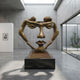 Monumental Contemporary Dual Figures Face Bronze Sculpture, 350cm, gold-toned bronze figures forming a face silhouette on a black plinth in a gallery setting.