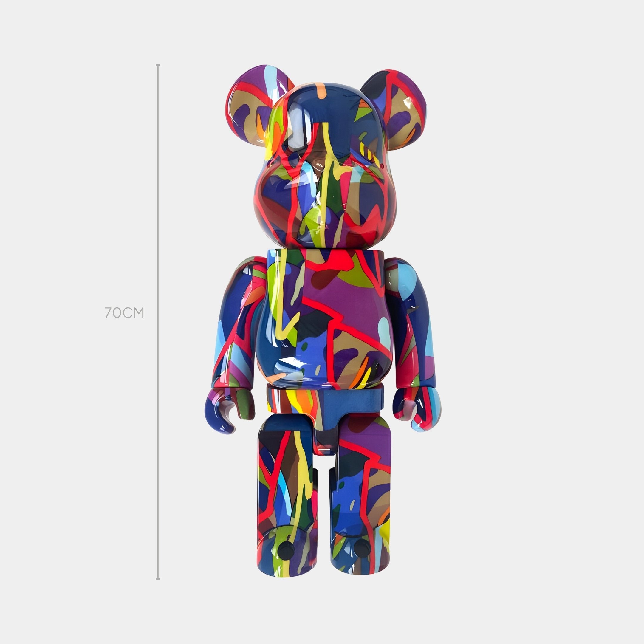 The Neon Glyph Bear Sculpture - 70cm by Giant Sculptures is a glossy resin figure featuring high-res hydro-dipped abstract streaks of blue, red, yellow, pink, and green on a white base.