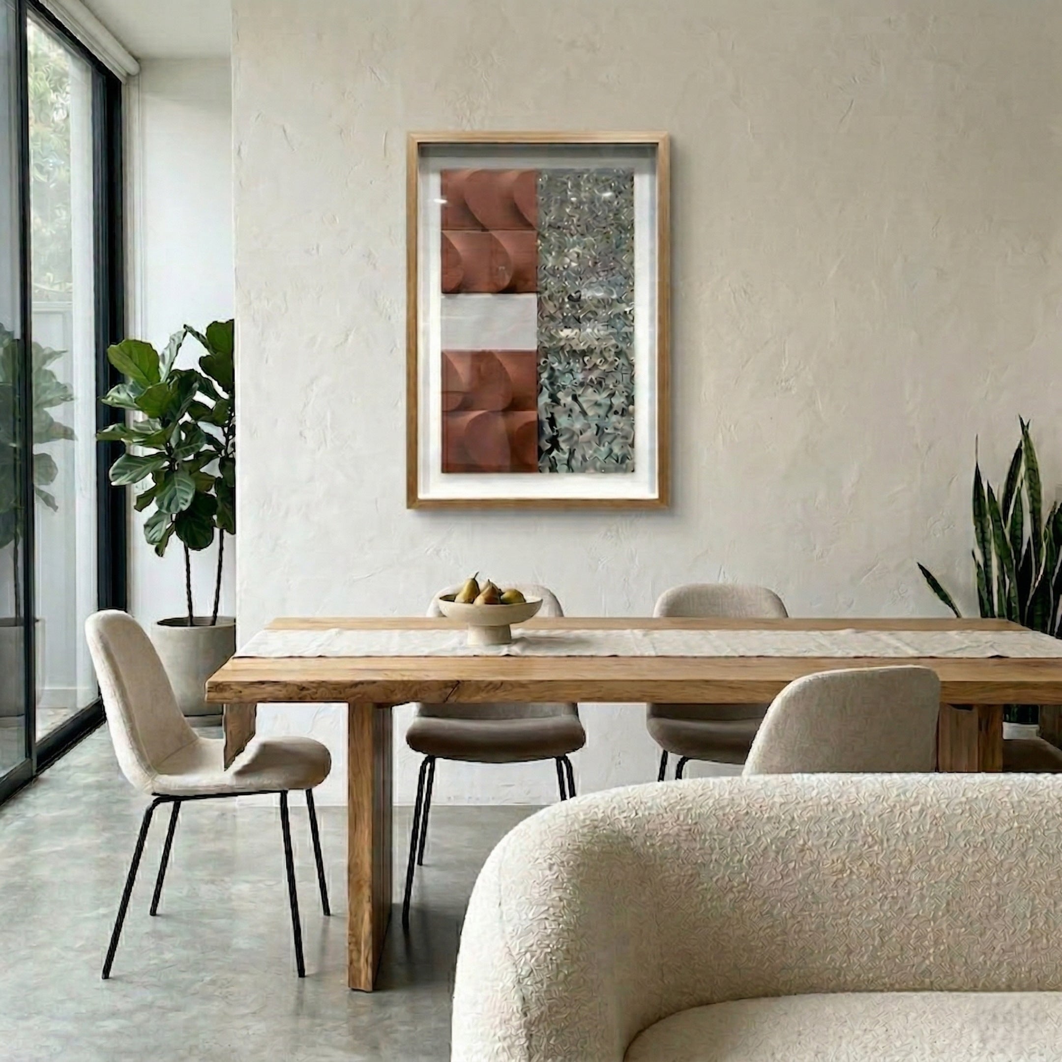 Crushline Terracotta & Silver Ripple Textured Metal 3D Wall Art by Giant Sculptures in a wood frame, displayed above a natural wood dining table in a neutral-toned room.