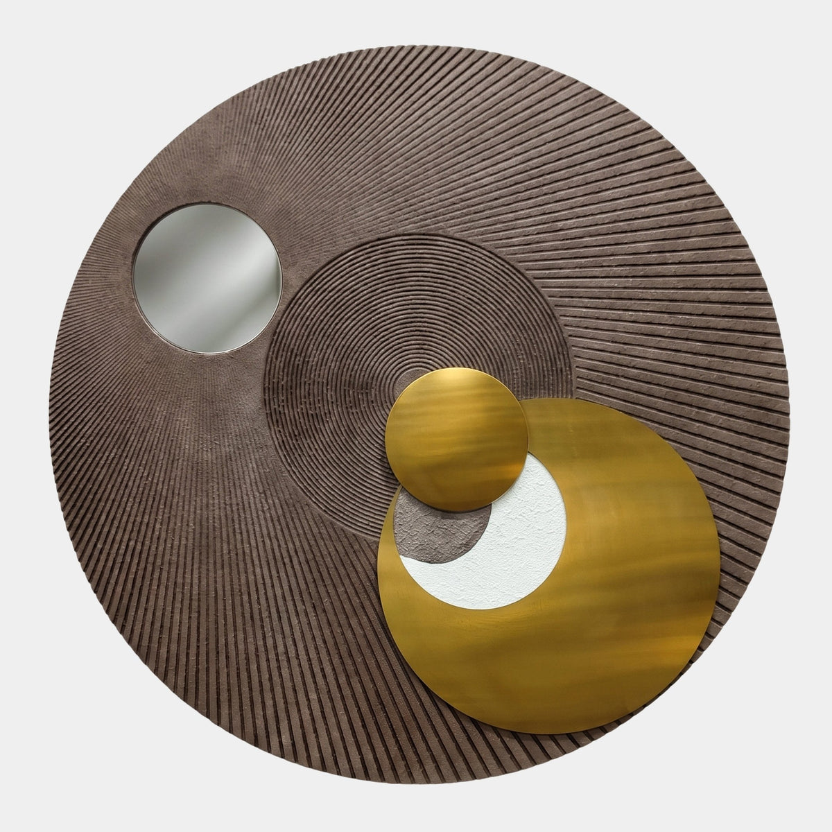 Orbitra Bronze Reflective Circular 3D Wall Art with ribbed brown textured disc, round mirror, and layered gold and white circular accents on a white background.