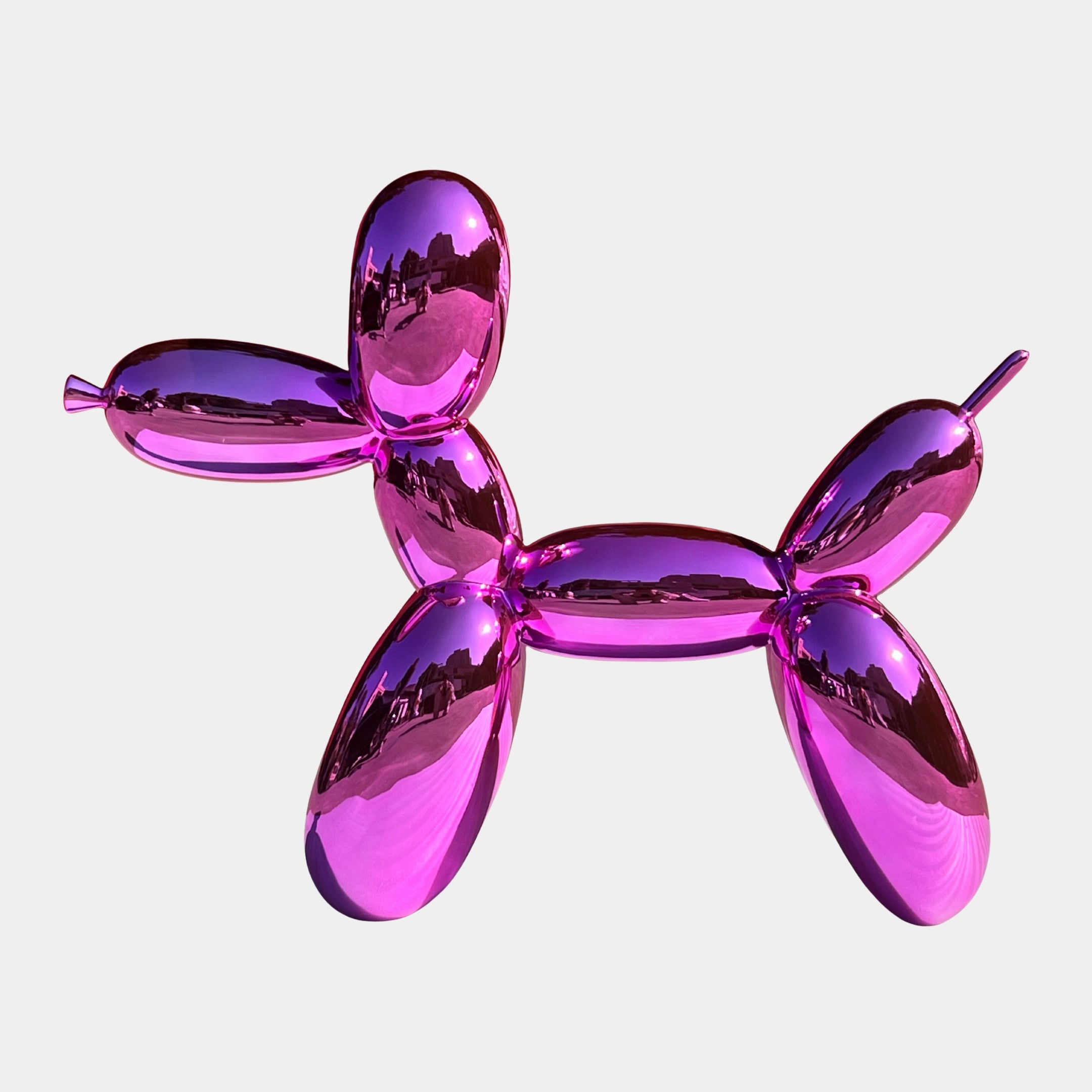 The Flamingo Pink Balloon Dog Sculpture - 80cm by Giant Sculptures is a vibrant modern piece that adds playful charm and a pop of color to any room, making it a perfect centerpiece for contemporary spaces.