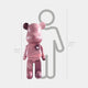 The Pinque Bear Sculpture - 135cm by Giant Sculptures is a limited edition art piece, shown beside a 160 cm (5 ft 3 in) gray figure for size comparison. Created in collaboration with Adam Illes and finished in pink.