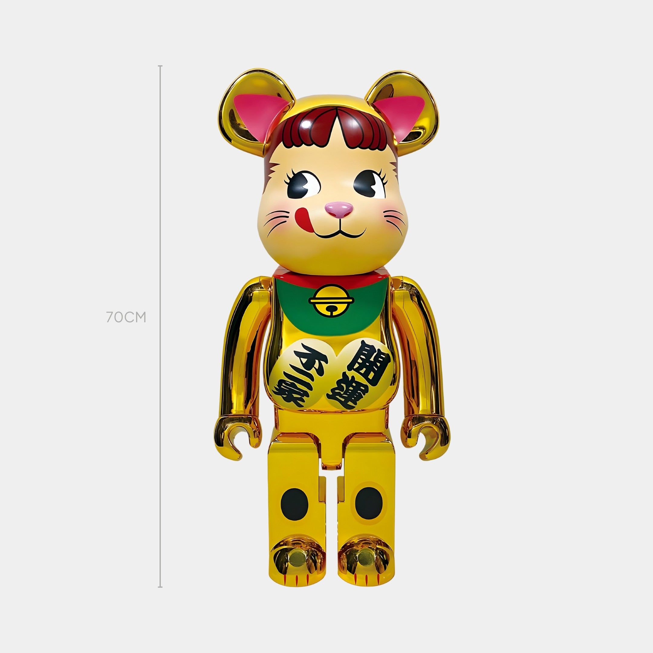 The Prosper Paw Gold Bear Sculpture by Giant Sculptures is a 70cm limited edition figure styled like a Maneki Neko, featuring cat ears, a green bib, red details, and black Japanese characters on its chest and leg.