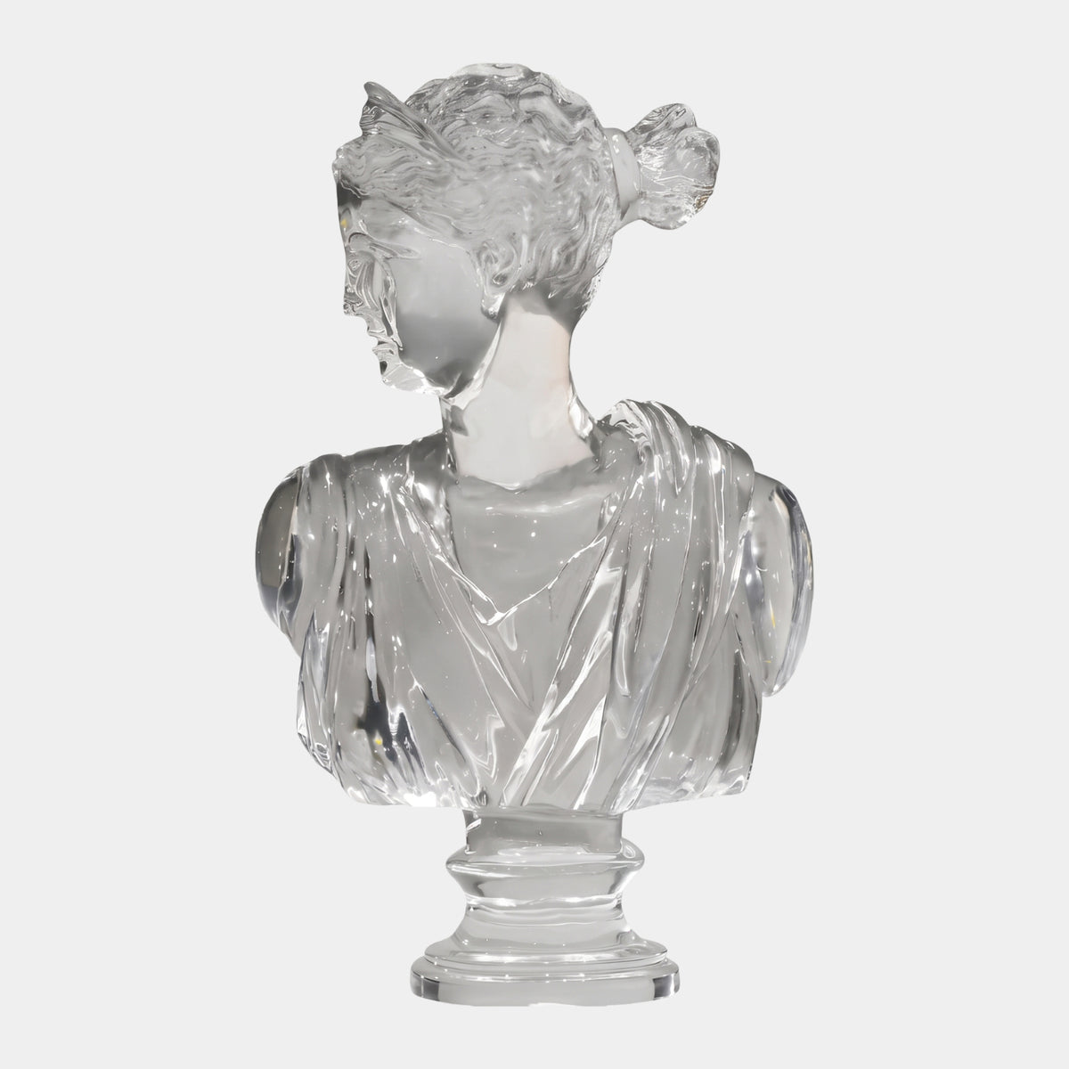 Clear Draped Woman Bust on a Turned Socle Resin Sculpture, 68cm, with hair knotted at the back and drapery off one shoulder, shown on a plain white background.