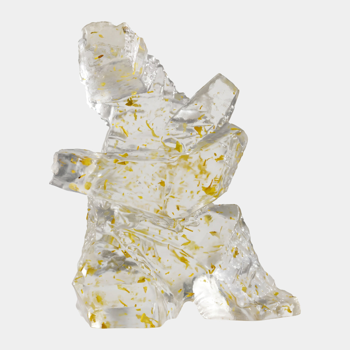 Clear Gold-Flecked Mid-Turn Torso Resin Sculpture (26cm) by Giant Sculptures, a twisted abstract figure with scattered gold flecks, shown on a plain white background.
