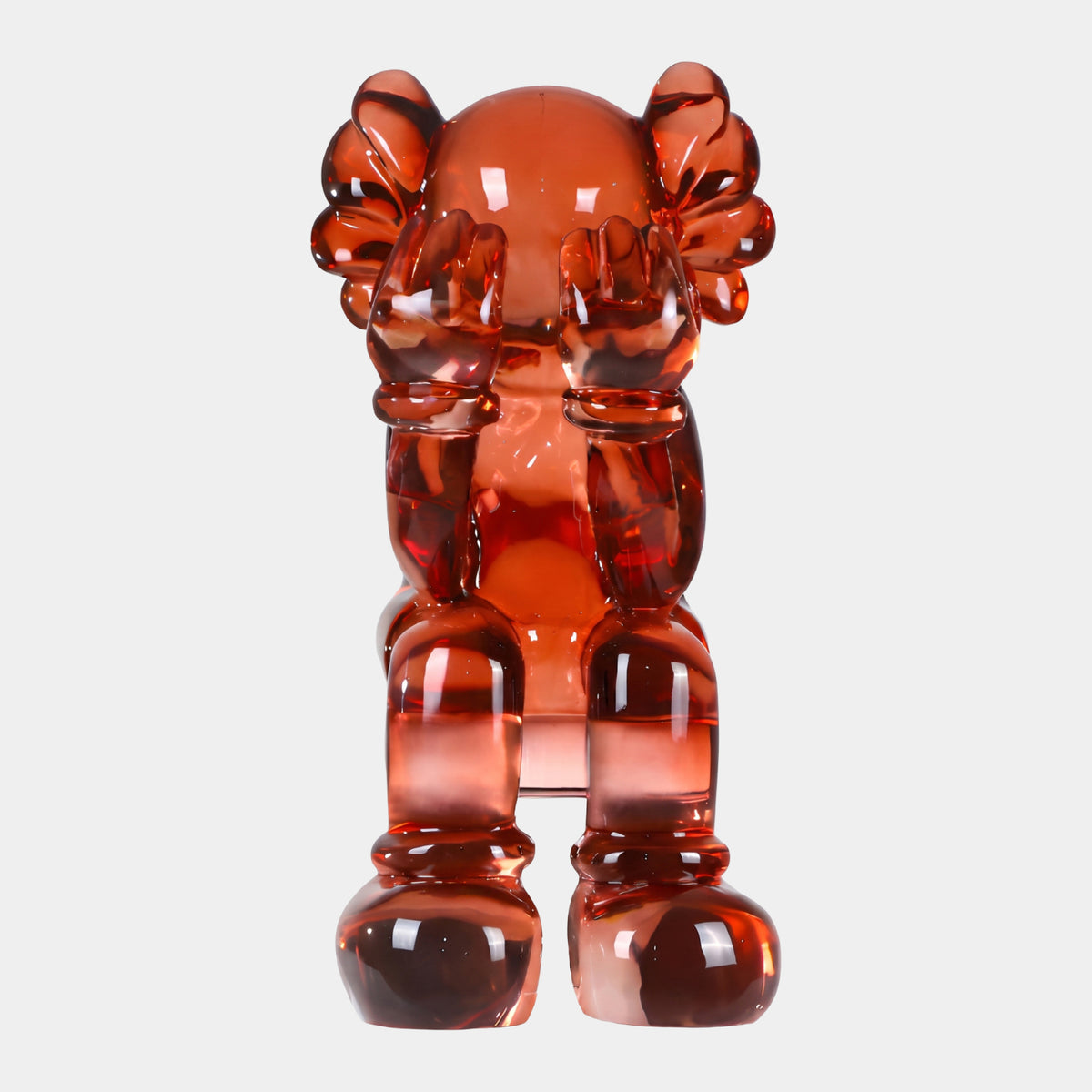 Translucent Red Iconify Standing Sculpture, 70cm, resin figure with hands covering face and lobed ears, on a plain white background.