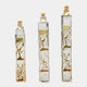 Three clear resin columns by Giant Sculptures in 135/158/200cm heights, each topped with a gilded guardian lion and featuring gold tree and bird reliefs, set on a plain white background.