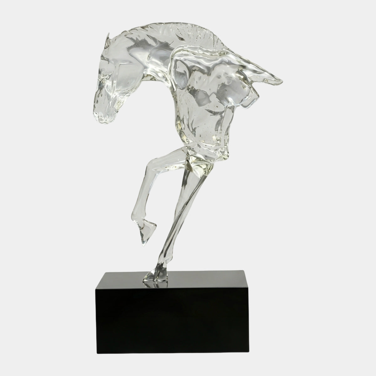Clear Horse Forequarters on a Black Marble Base Resin Sculpture, 150cm, showing a lowered head and raised foreleg, set on a black marble block against a plain white background.