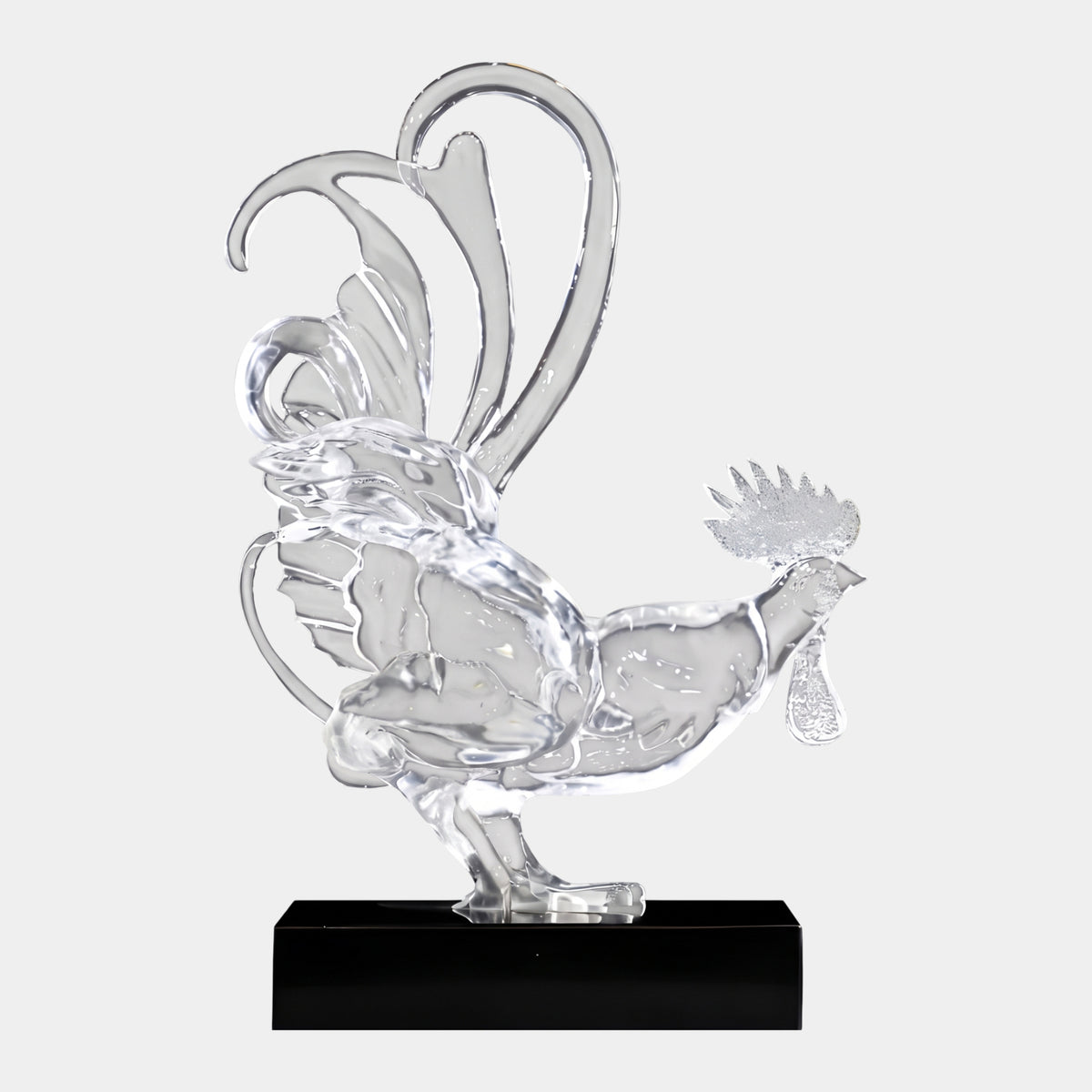 Clear Cockerel with Sweeping Tail on Marble, 56cm, a clear resin sculpture with raised comb and arched tail plumes on a black marble base, shown against a plain light background.