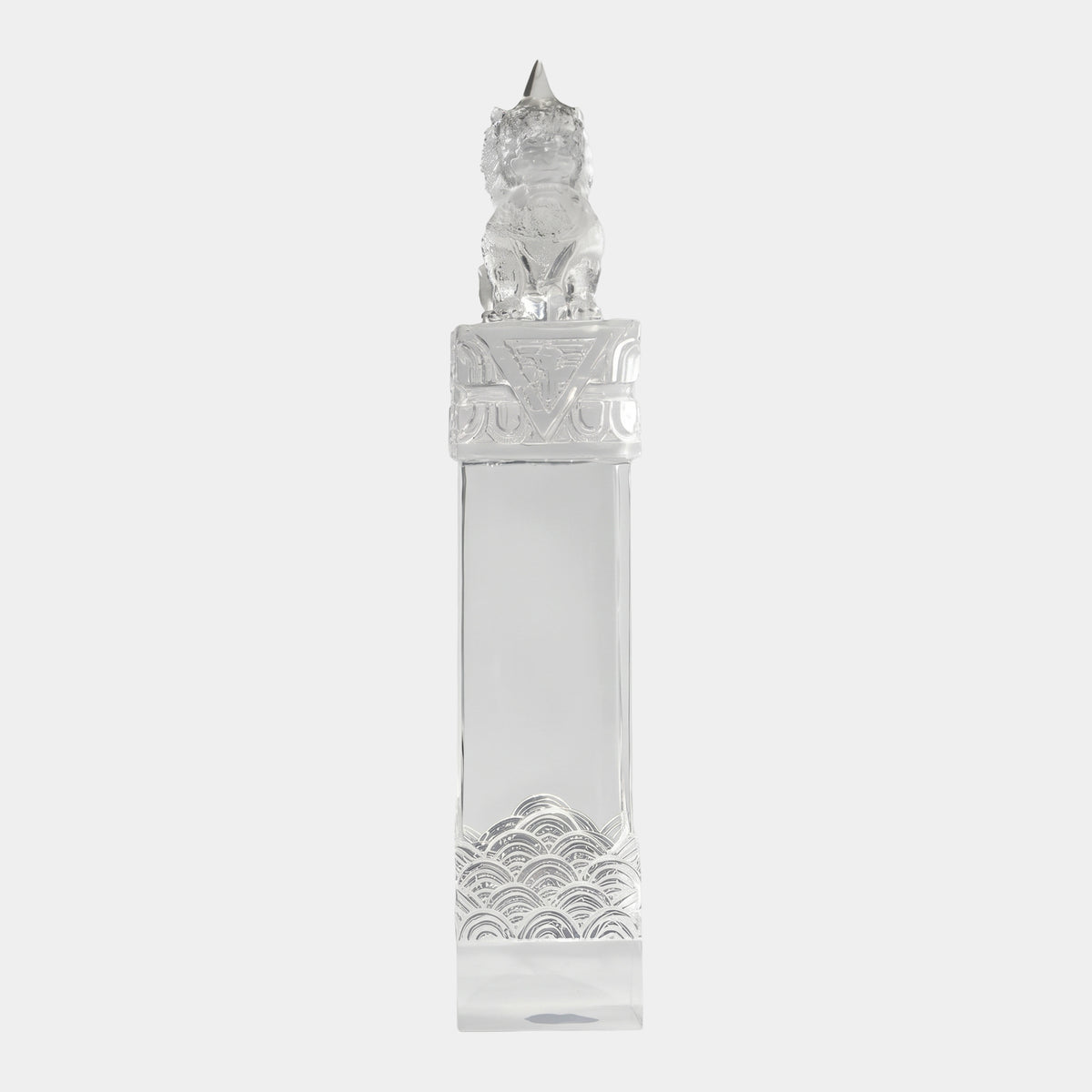 Clear Horned Beast on Banded Resin Column (86cm) by Giant Sculptures, showing a horned beast atop a tall clear column with scale-patterned base, on a plain white background.