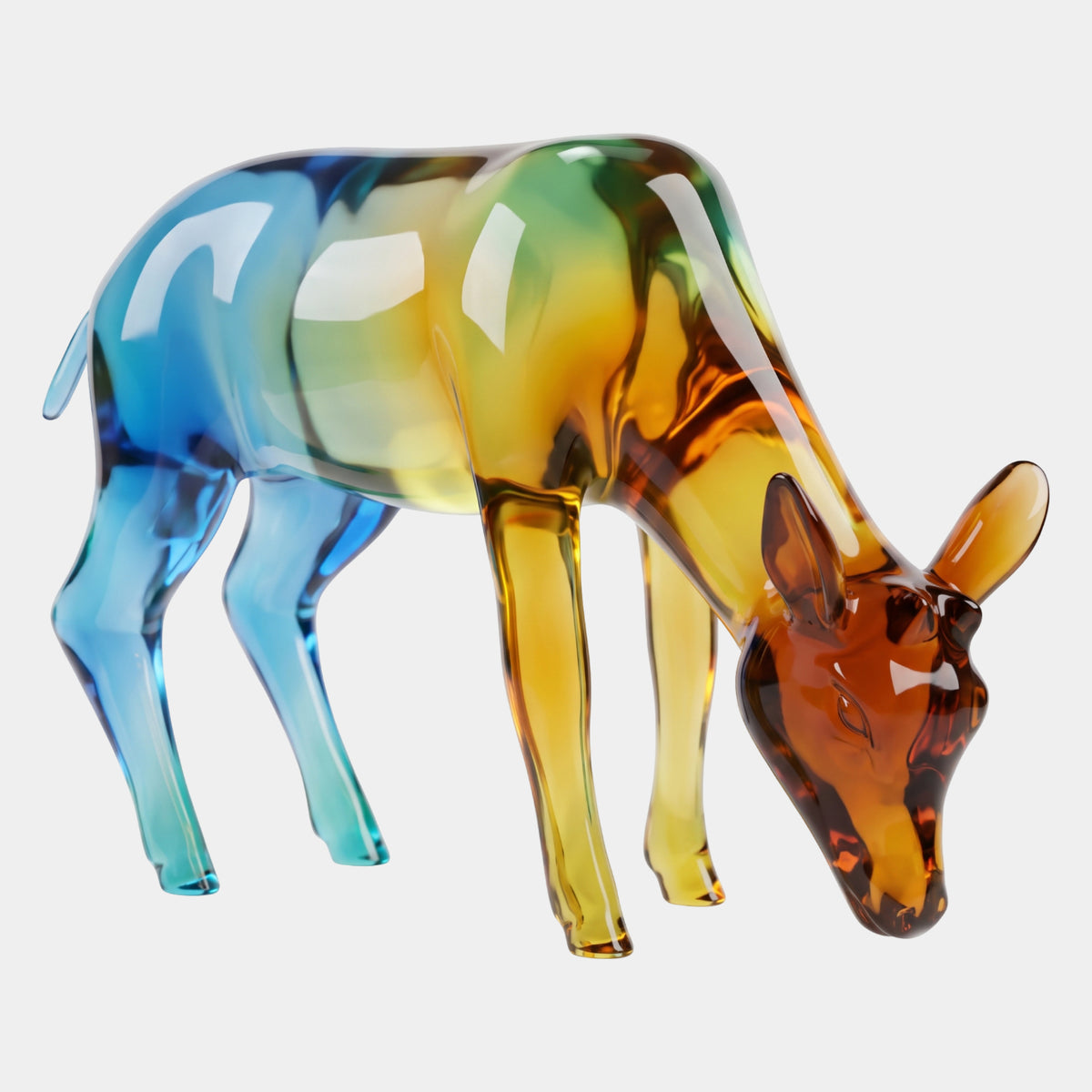 Multi-Colour Graded Grazing Deer Resin Sculpture - 61cm, head lowered as if feeding, amber-to-blue gradient finish, shown on a plain white background.