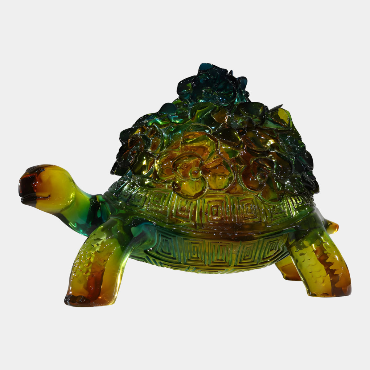 Multi-Colour Graded Tortoise with Carved Shell – 61cm resin sculpture with green-to-amber finish, carved scroll and fret pattern on shell, head extended, on a plain white background.