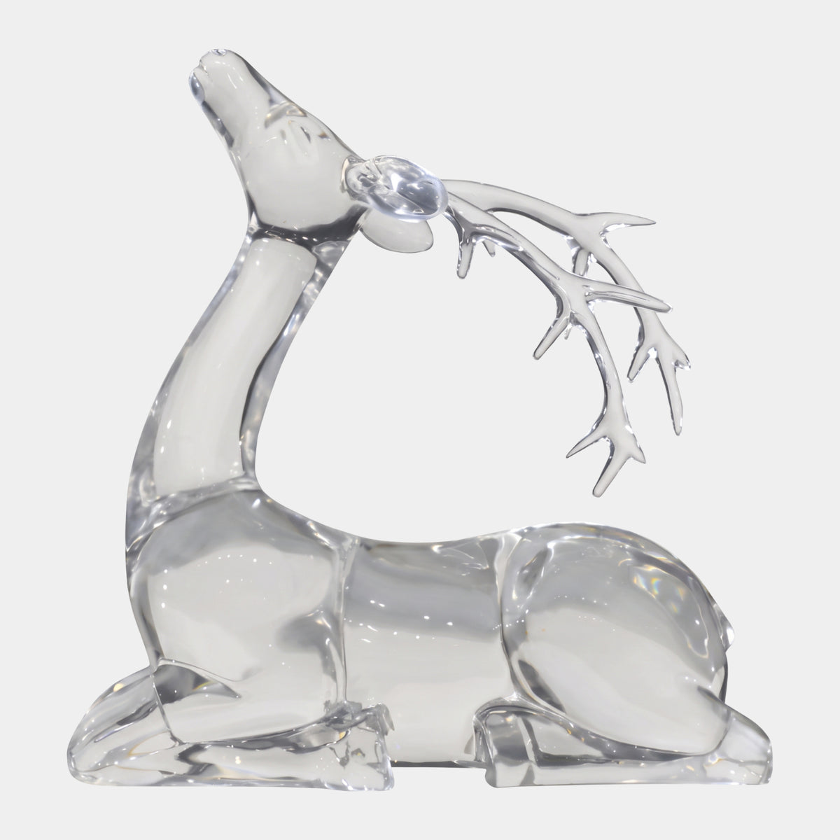 Clear Lying Stag with Swept-Back Antlers - 61cm, resin sculpture with head tipped back and antlers swept low toward the haunch, shown on a plain white background.