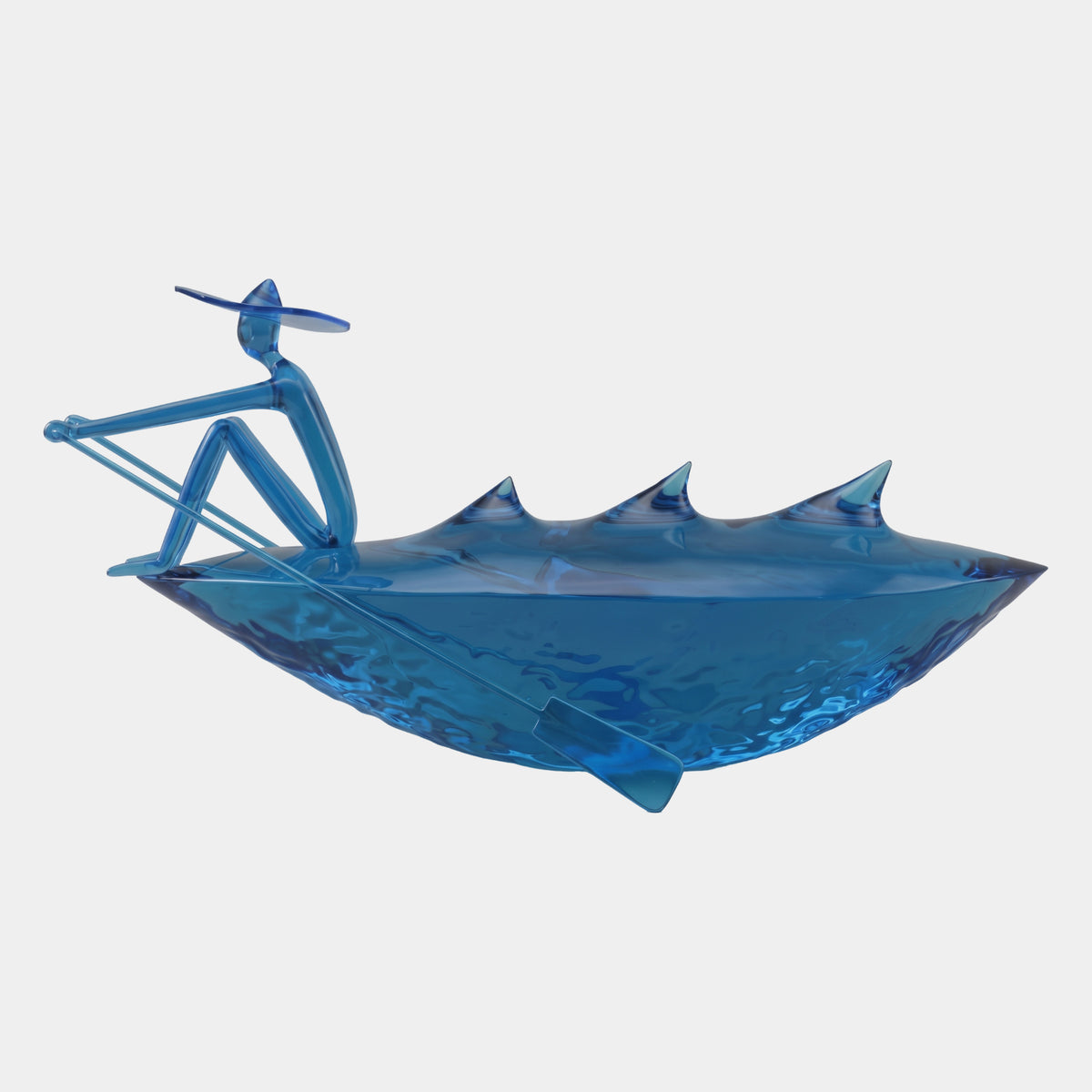 Blue Plated Fish Boat with a Figure, 230cm, by Giant Sculptures, a fin-spined fish-shaped hull with rippled interior and a seated hatted figure holding an oar, against a plain light background.