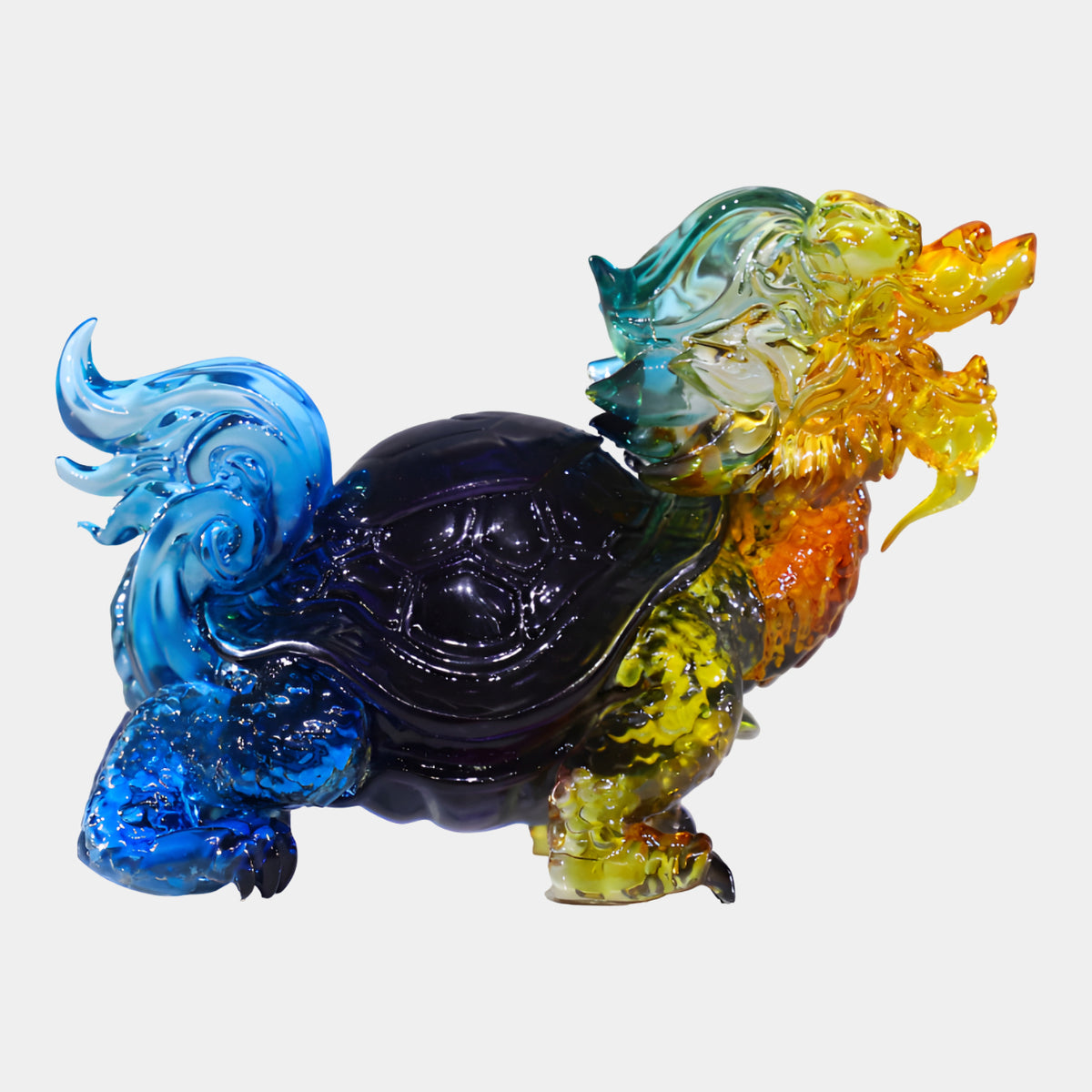 Multi-Colour Dragon Tortoise Resin Sculpture, 14cm, with hexagonal shell, curled tail, and horned dragon head in blue, violet, yellow and orange tones, on a plain white background.
